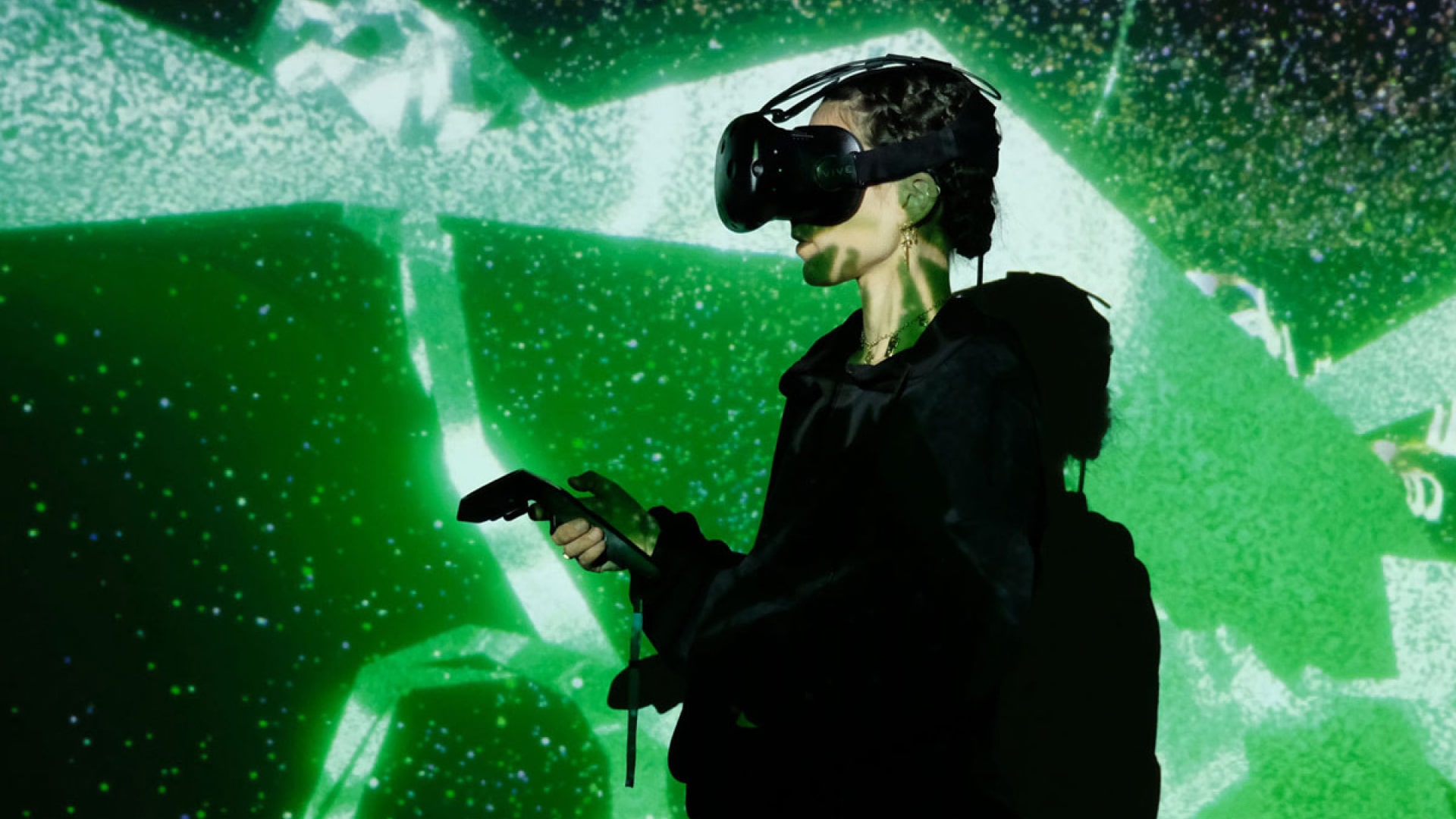 VR performer in green light